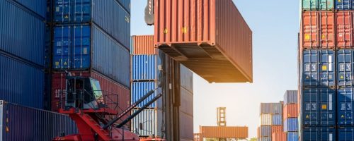 forklift-working-in-the-container-cargo-yard-port-loading-cargo-tank-logistic-service-and-transport-e1665466492906.jpg